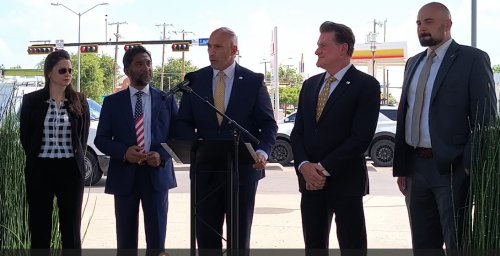 Mayor Omar speaking at plaque unveiling